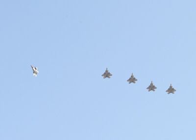 US Air Force F-22 Raptors fly in formation as they prepare to land. US Air Force photo