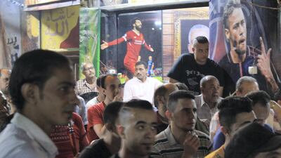 Liverpool fans celebrate in Cairo. Adham Youssef