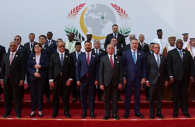 Iraq's Prime Minister Ali Al Zaidi, centre, hosted representatives of Islamic countries at an OIC meeting in Baghdad. Reuters