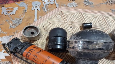 Foam-tipped bullets, tear gas and smoke bombs. Sarah Maisey / The National