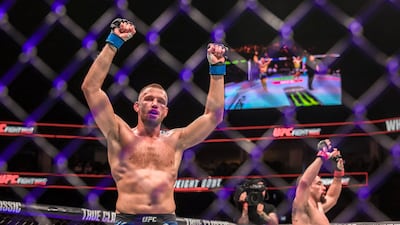 Reinier de Ridder, left, and Robert Whittaker after a tense battle in the main middleweight bout during UFC Fight Night at the Etihad Arena in Abu Dhabi. All photos: Victor Besa / The National