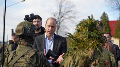 Prince William meets members of the Polish military during a visit to the 3rd Brigade Territorial Defence Force base. Getty