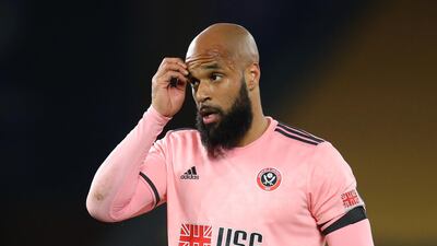 Sheffield United's David McGoldrick looks dejected at the end of the match after being relegated from the Premier League. Reuters