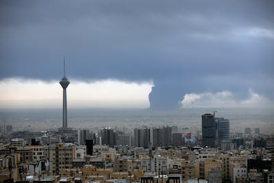 Smoke rises from Shahran oil depot in Tehran after US and Israeli attacks. The Iranian capital already suffers from poor air quality. Anadolu via Getty Images