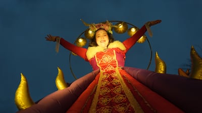 A street performer takes part in the 'Procession of Light' in the centre of Dublin, Ireland. PA