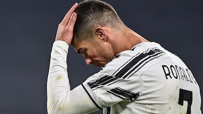 Cristiano Ronaldo reacts after missing a chance. AFP