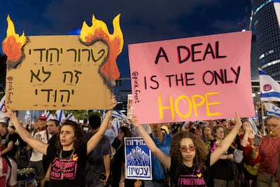 Protesters gather in Tel Aviv to demand Israel's government take action to secure the release of hostages seized by Hamas on October 7. Getty Images