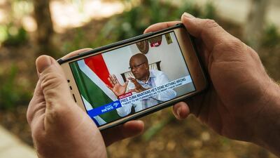Jacob Zuma, South Africa's president, is displayed on a mobile device as he gives a televised interview in Pretoria, South Africa.