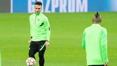 Inter Milan striker Lautaro Martinez and midfielder Arturo Vidal attend a training session of at Santiago Bernabeu in Madrid, Spain ahead of the Group D Uefa Champions League match against Real Madrid. EPA