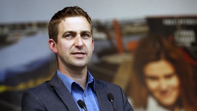 Brendan Cox, widower of murdered British MP Jo Cox makes a speech during a gathering to celebrate her life, in Trafalgar Square, London. Alastair Grant/ AP Photo