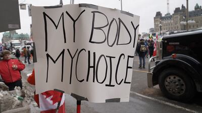 A sign in front of Canada's Parliament reads 'My body, my choice'. Willy Lowry / The National