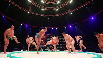 Sumo wrestlers take part in a press conference and training session ahead of the All Star Sumo competition, Abu Dhabi. Chris Whiteoak / The National