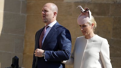Mike Tindall and Zara Tindall, wearing a cream coat and blush hat, attend the Easter Sunday service at St George's Chapel on April 21, 2019 in Windsor, England. Getty Images