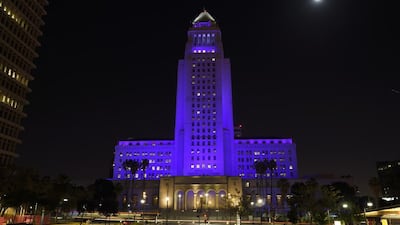 In Los Angeles, City Hall was illuminated in purple light. Mark J Terrill / AP photo