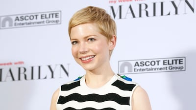 In a black and white mini dress at the 'My Week With Marilyn' photocall in Berlin, Germany on February 17, 2012. EPA