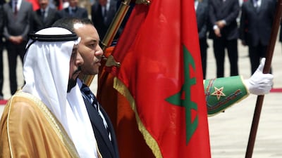 Sheikh Khalifa bin Zayed, UAE President, stands with King Mohammed VI during a welcoming ceremony at Casablanca Royal Palace in 2006. AFP