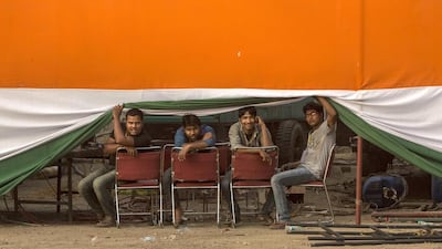 Supporters of Rahul Gandhi, the leader of India’s ruling Congress Party, gather at a rally in New Delhi, India. Kevin Frayer / Getty Images