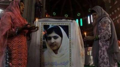 Pakistani Christians attend a mass praying for the recovery of child activist Malala Yousafzai at a church in Lahore, Pakistan.
