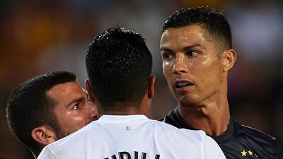 Jose Luis Gaya and Jeison Murillo of Valencia argue with Cristano Ronaldo. Getty Images