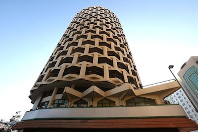 Experts consider the Al Ibrahimi Tower on Electra Street a rare and world-class example of a building of its kind, yet the architect is unknown. Fatima Al Marzooqi / The National