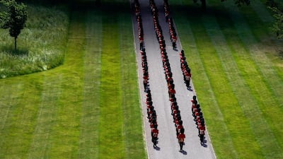 Guards leave Windsor Castle after the ceremony to mark the official birthday of Queen Elizabeth II. Getty Images