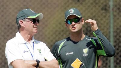 Australian captain Michael Clarke, right, is pictured during a training session ahead of the tri-series against South Africa and hosts Zimbabwe at the Harare Sports Club on August 23, 2014. Jekesai Njikizana / AFP