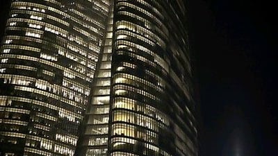 The Adia building at night. Adia is working on streamlining its operations. The National