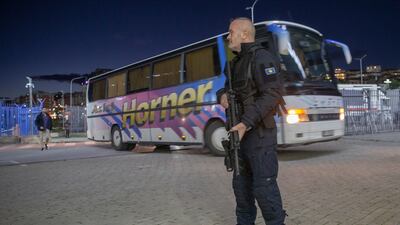 A Kosovo police officer secures the area at the Fadil Vokrri Stadium in Pristina, Kosovo as the Israeli national team arrive for a Euro 2024 Group I qualifier on Sunday, November 12, 2023. AP