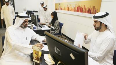 Hamad Al Rahoomi registers to be an FNC candidate at the World Trade Centre in Dubai. Sarah Dea / The National
