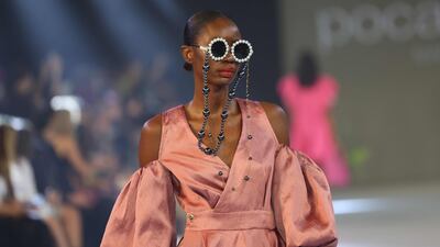 Models for Poca and Poca sport funky accessories. AFP