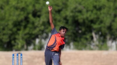 Warriors' Rishabh Rajagopalan bowls in the game between Legend v Simply Warriors in the Gulf Cup. Sunday, December 13, 2020 in Ajman. Chris Whiteoak / The National
