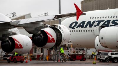 Ground staff preparing a Qantas Airbus A380 aircraft for flight. The carrier is pioneering ultra-long-haul flights. Saeed Khan/AFP