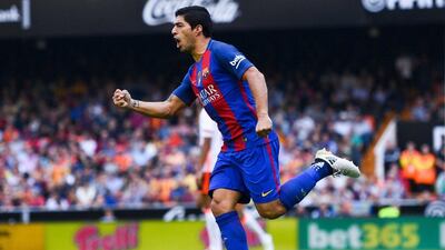 Luis Suarez of FC Barcelona celebrates after scoring his team’s second goal. David Ramos / Getty Images