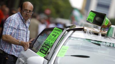 While Uber is not currently operating in Madrid, taxi drivers are protesting against its imminent launch and the government's lack of regulation on the app. Uber services are only available in Barcelona at the moment. Hugo Ortuno / EPA