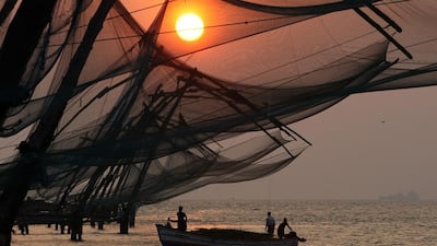 Chinese fishing nets, as seen from Fort Kochi. Visitors can buy fresh seafood catches from stalls in the Keralan city. Pawan Singh / The National