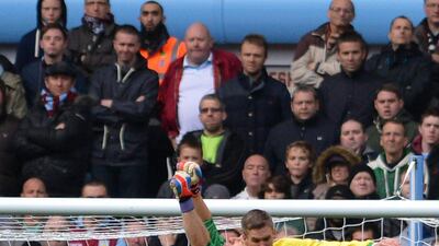 Villa and Norwich players challenge for the ball at Villa Park. Carl Court/AFP