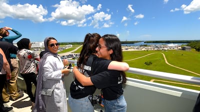 Alia Al Mansoori watches the SpaceX Falcon 9 rocket launch from Kennedy Space Center. Scott A Miller for The National
