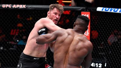 Stipe Miocic punches Francis Ngannou in their UFC heavyweight championship fight. Jeff Bottari / USA TODAY Sports / Reuters