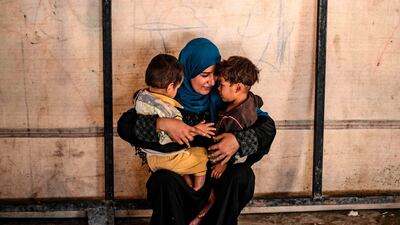 A volunteer at the camp in Ain Issa looking after orphaned children reportedly linked with foreign ISIS fighters in September. AFP