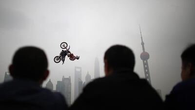Michael Norris of Australia performs during a presentation of the World Extreme Games in Shanghai. The games will be held in Shanghai from April 30 to May 3. Carlos Barria / Reuters