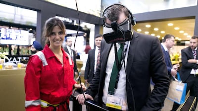 A man tries on a virtual reality goggle at Akon City’s stand at Arabian Travel Market. Reem Mohammed / The National