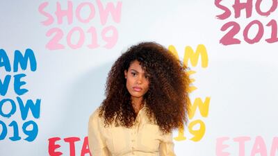 Tina Kunakey Cassel arrives for the Etam show during Paris Fashion Week on September 24, 2019. AFP