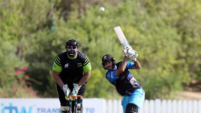 ECB Blues' Chirag Suri bats during the opening match of the Emirates D10 tournament against Dubai Pulse Secure (DPS) at the ICC Academy in Dubai on Friday. Chris Whiteoak / The National