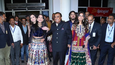 In this Friday, Nov. 30, 2018 photo, Chairman of Reliance Industries Mukesh Ambani, centre, his wife Nita Ambani, back left, daughter Isha Ambani, right, son Anant Ambani and Radhika Merchant, front left, arrive to attend the wedding of Bollywood actress Priyanka Chopra and Nick Jonas in Jodhpur, India. Photo: AP