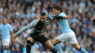 epa03467102 Tottenham's Sandro (L) vies for the ball with Manchester City's David Silva (R) during English Premier League soccer match at Etihad Stadium, Manchester, Britain, 11 November 2012. EPA/PETER POWELL DataCo terms and conditions apply. http//www.epa.eu/downloads/DataCo-TCs.pdf *** Local Caption *** 03467102.jpg