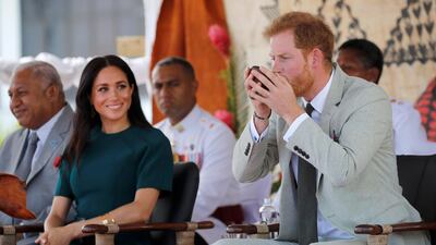 Britain's Prince Harry and Meghan, Duchess of Sussex, attend a ceremony at Nadi airport. Reuters