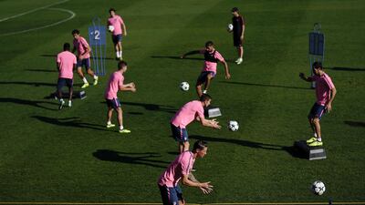 Atletico Madrid players take part in training ahead of the Uefa Champions League match against Chelsea. Gonzalo Arroyo Moreno / Getty Images