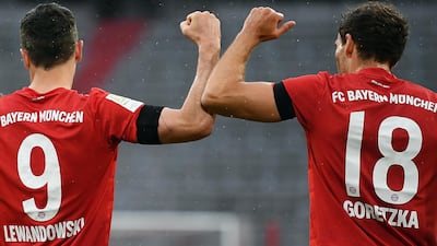 Bayern Munich's Leon Goretzka celebrates with Robert Lewandowski after scoring the opening goal against Eintracht Frankfurt. EPA
