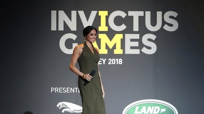 Meghan, Duchess of Sussex, wears Antonio Berardi and Aquazzura heels at the Invictus Games in Sydney, on October 27, 2018. AP