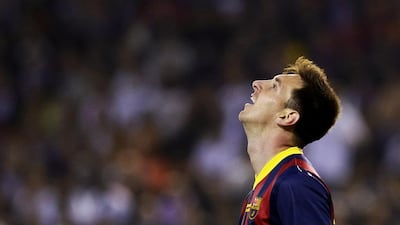 Barcelona forward Lionel Messi reacts during the Spanish Copa del Rey final against Real Madrid at the Mestalla in Valencia on April 16, 2014. Dani Pozo / AFP